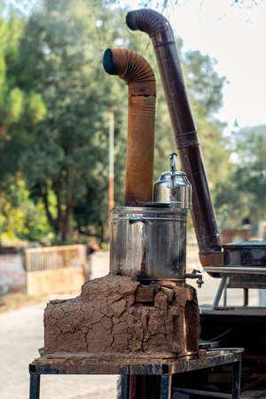 semaver - a stove for boiling water - in a roadside diner in rural Turkeyの写真素材