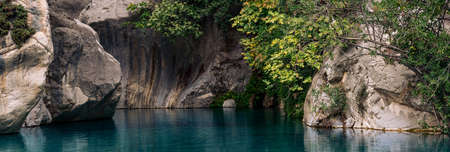 natural rocky canyon with clear blue water in Goynuk, Turkey