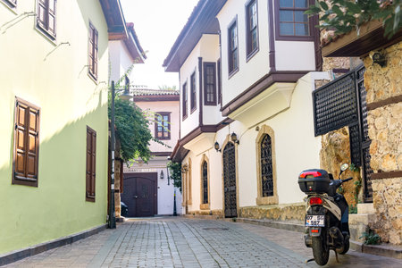Antalya, Turkey - November 15, 2021: motorbike parked on an historical street in KaleiÃ§iのeditorial素材