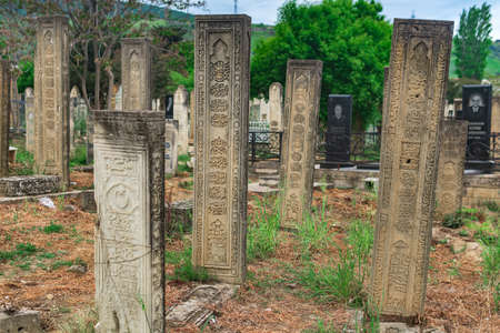 Derbent, Russia - May 09, 2022: gravestones at the old traditional Muslim cemetery Kyrkhlyar in Derbent, Dagestanのeditorial素材
