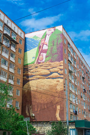 Derbent, Russia - May 11, 2022: mural on the wall of a house in Derbent, Dagestanのeditorial素材