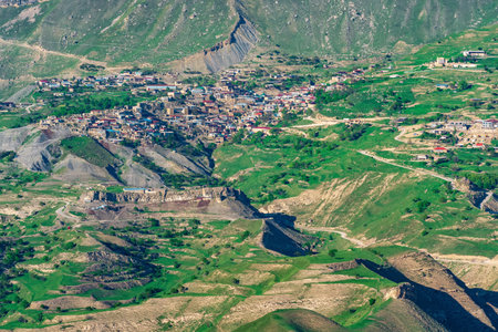 view of the mountain village of Chokh in Dagestan on the slope of a vast valleyの写真素材