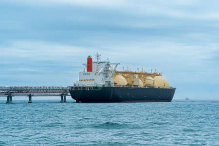 liquefied natural gas tanker during loading at an LNG offshore terminalの写真素材