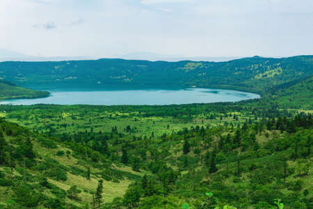 view of the Golovnin volcano caldera with hot lake on Kunashir islandの写真素材