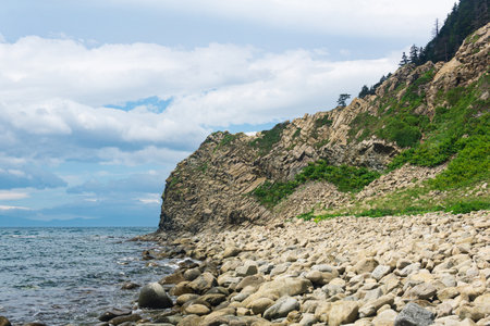 coast of Kunashir Island with basalt coastal cliffの写真素材