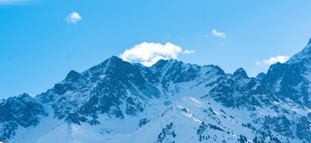 natural landscape with distant snowy mountain range blue in atmospheric hazeの写真素材