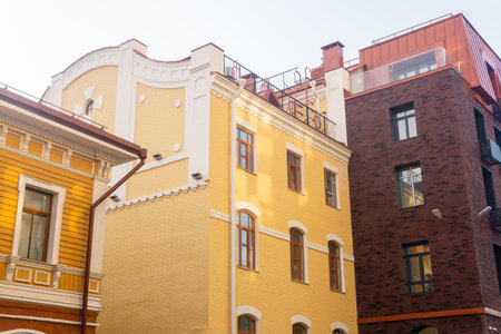 cityscape, urban background, group of facades of modern and vintage buildingsの写真素材