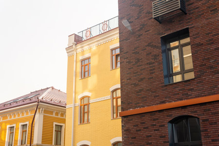 cityscape, urban background, group of facades of modern and vintage buildingsの写真素材
