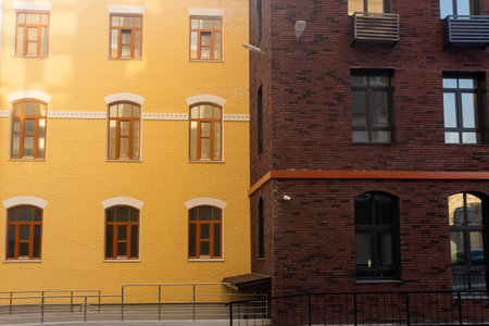 cityscape, urban background, group of facades of modern and vintage buildingsの写真素材