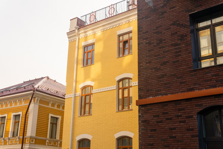 cityscape, urban background, group of facades of modern and vintage buildingsの写真素材
