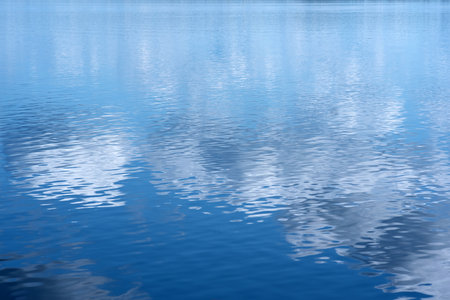 natural background, water landscape, shiny water surface with reflectionの写真素材