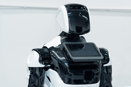 Perm, Russia - July 13, 2023: switched off humanoid robot with an interactive display and a screen instead of a face that can display emotionsのeditorial素材