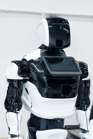 Perm, Russia - July 13, 2023: switched off humanoid robot with an interactive display and a screen instead of a face that can display emotionsのeditorial素材
