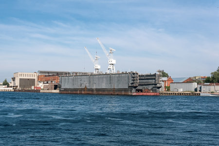 floating dock against the backdrop of a shipyardの写真素材