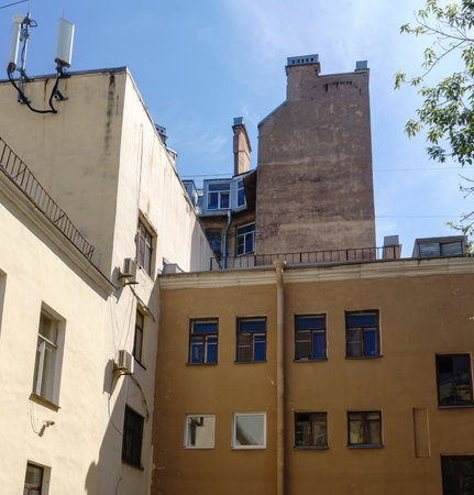 old residential buildings in the historical center of the city, view from the courtyardsの写真素材