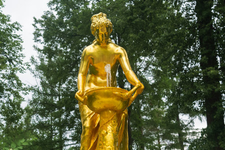 Saint Petersburg, Russia - June 06, 2024: fountain with sculpture in Peterhof Palace parkのeditorial素材