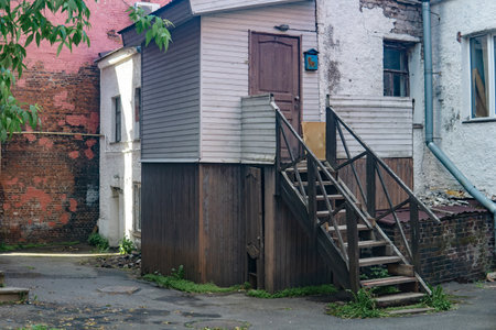 town background, provincial courtyard among old buildingsの写真素材