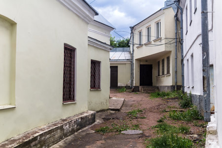 town background, provincial courtyard among old buildingsの写真素材