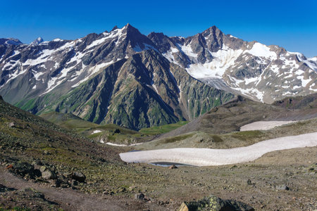 mountainous landscape with high peaks and glaciersの写真素材