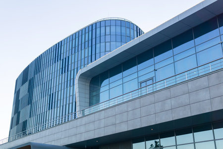 modern architecture, glass facade element of contemporary building against evening skyの写真素材