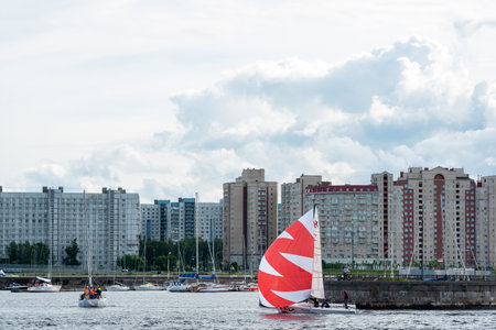 Saint-Petersburg, Russia - June 12, 2024: cityscape with boats on the Neva and residential buildings...