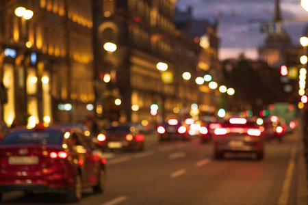 blurred abstract urban background, night city street with busy trafficの写真素材