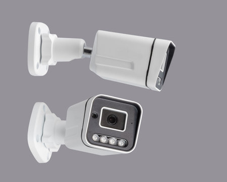 surveillance security camera isolated on gray background in different projectionsの写真素材