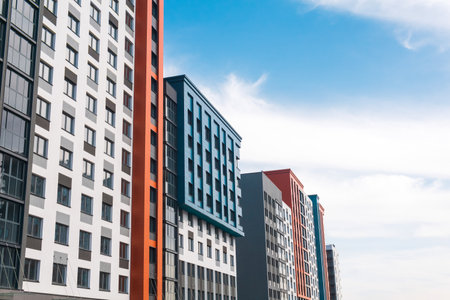 Modern apartment buildings in the city center on a sunny dayの写真素材