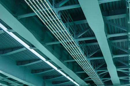 view from below of the bridge supporting beams, close up of steel structureの写真素材