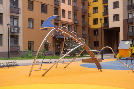 Children's playground in the courtyard of a residential buildingの写真素材