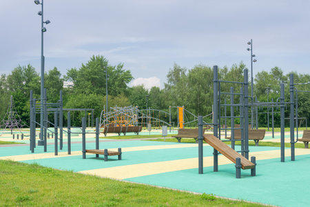 sports ground and playground in the park on a cloudy summer day.の写真素材