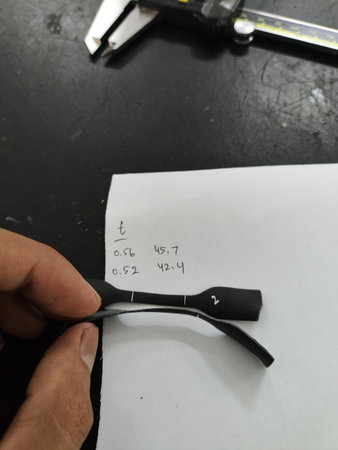 a man holding a test sample for experiment and researchの写真素材