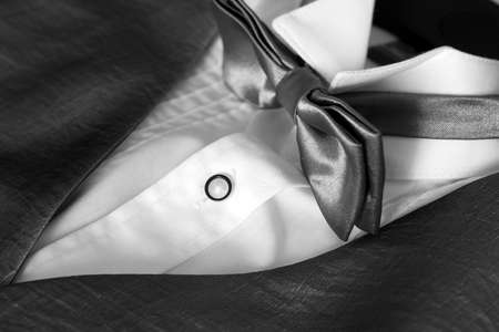 jacket with white shirt and bow tieの写真素材
