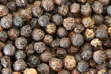 black peppercorns background