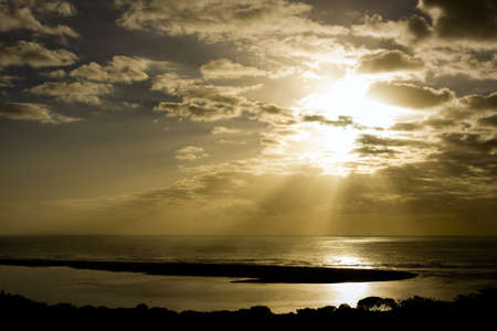 Sunrise or sunset ovet the oceanの写真素材