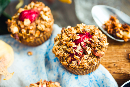 vegan oat muffins with cherries and granola, healthy dessert, pastryの写真素材