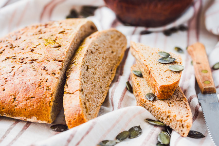 homemade rye bread unleavened with flax and pumpkin seeds, slices, yeast free, healthy organic foodの写真素材