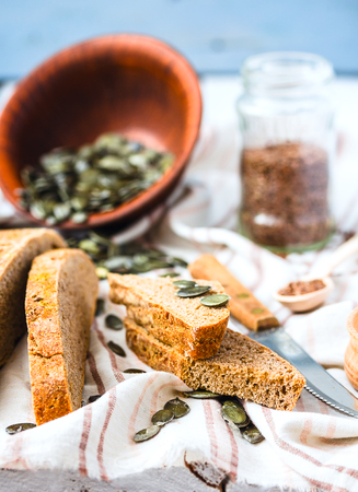 homemade rye bread unleavened with flax seed and pumpkin slices, yeast free, healthy organic foodの写真素材