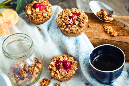 oat muffins with cherries and granola, healthy dessert, pastryの写真素材