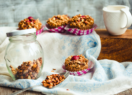 vegan oat muffins with cherries and granola, healthy dessert, pastryの写真素材