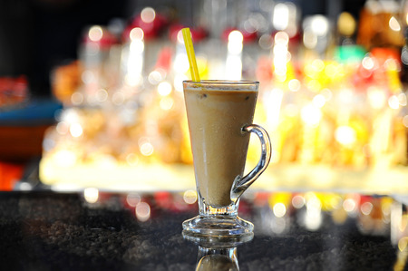 ice coffee on table with bokeh background