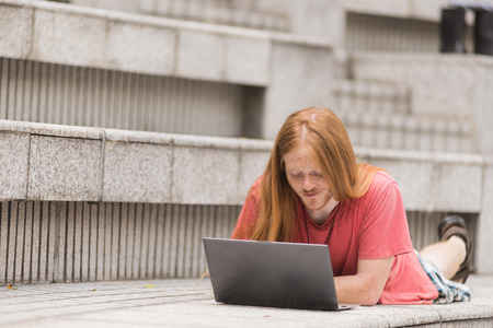 Working redhead Man in Hong Kong Islandの写真素材