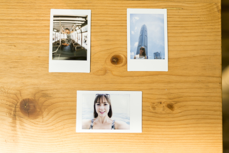 Self-portrait of pretty blond Girl in an asiactic Cityの写真素材