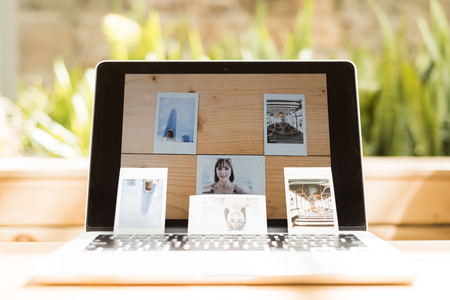 3 Self-portrait photos on a Laptop of a cute Girlの写真素材