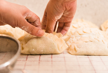 Choosing Homemade Dumpling at Home.の写真素材
