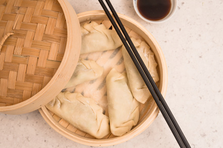 Homemade Dumpling in a Container before Steamingの写真素材