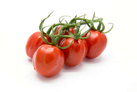 Bunch of piccadilly tomato on white isolated backgroundの写真素材