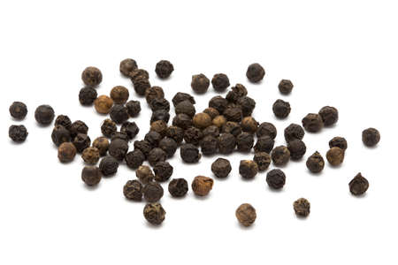 Black pepper on white isolated backgoundの写真素材