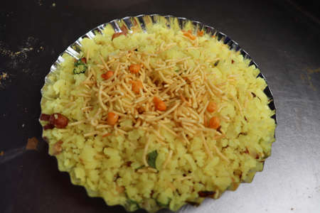 Flattened rice or Poha is rice which is flattened into flat, light, dry flakes originating from...