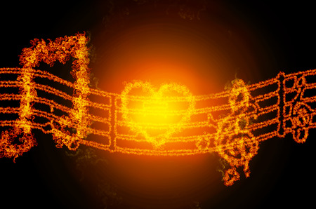 abstract fire musical notes sign isolated on black backgroundの写真素材